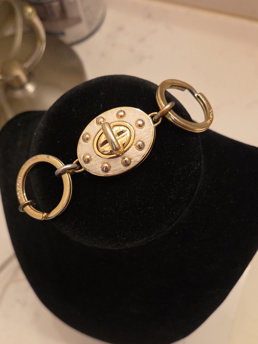 Coach Gold-Tone Oval Turn-Lock Key Chain
